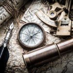 Map and compass and telescope